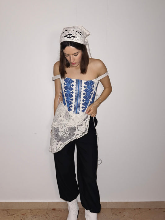 Folk corset with blue geometric motifs